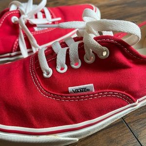 Red Vans.